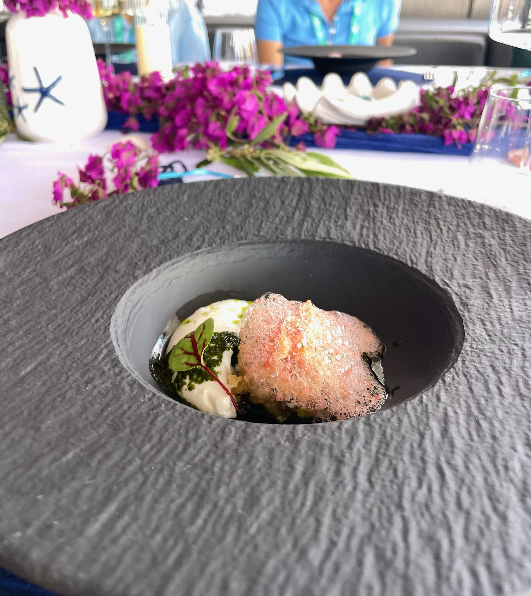 Opening course served on slate aboard ADARA NEXT