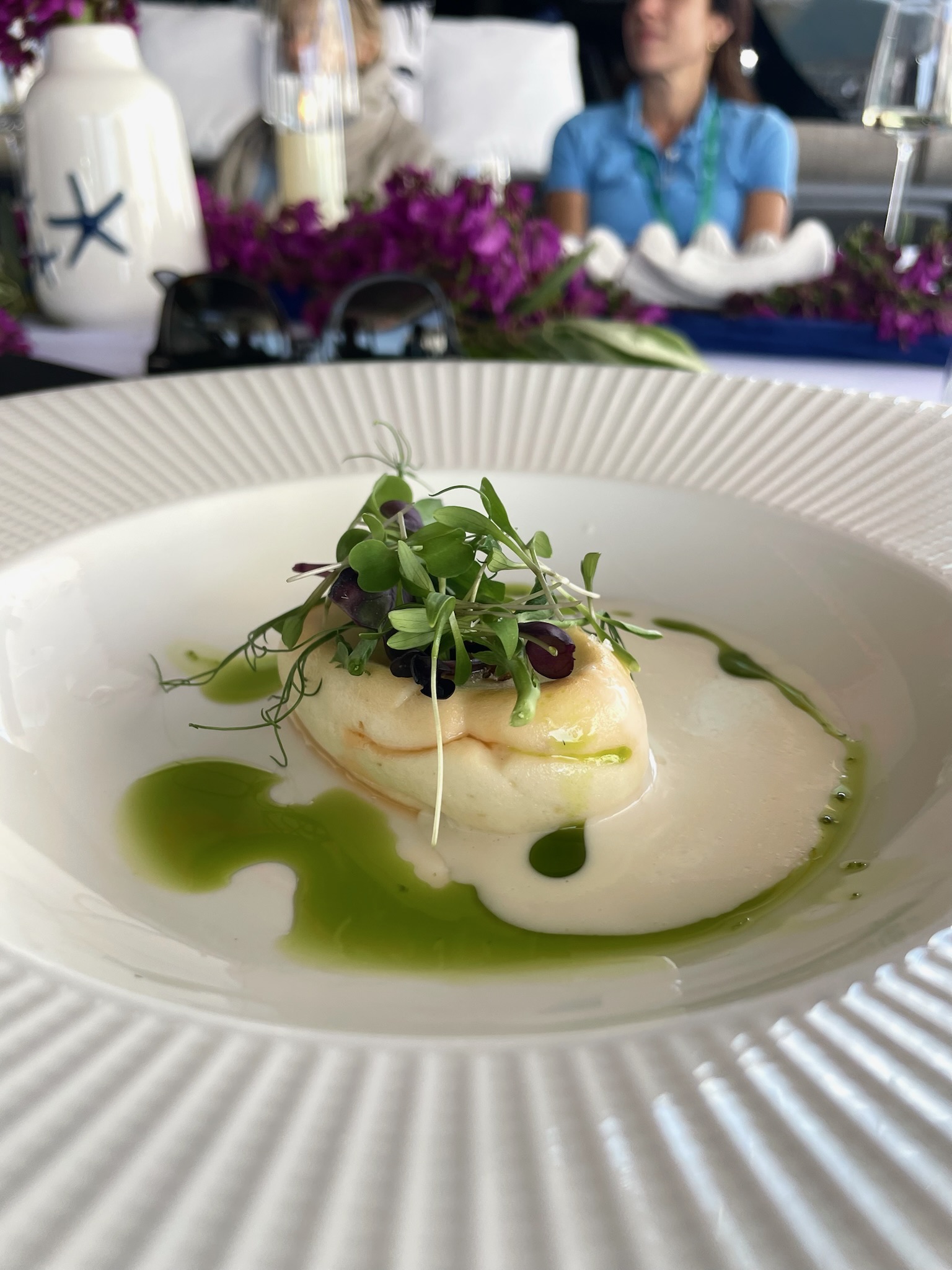Fish course with pale sauce and green oil
