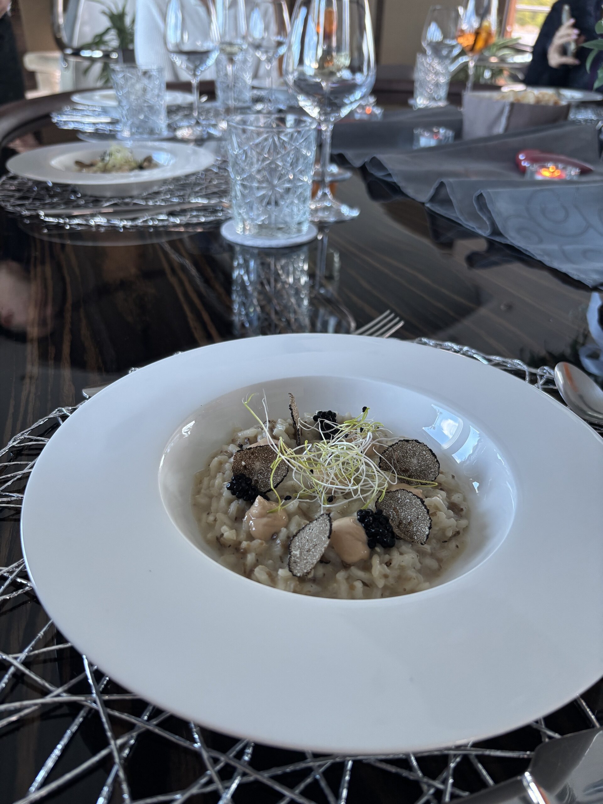 Truffle risotto plated on board