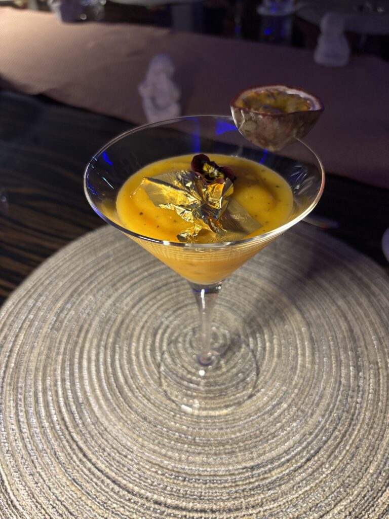 Mango dessert finished with gold leaf