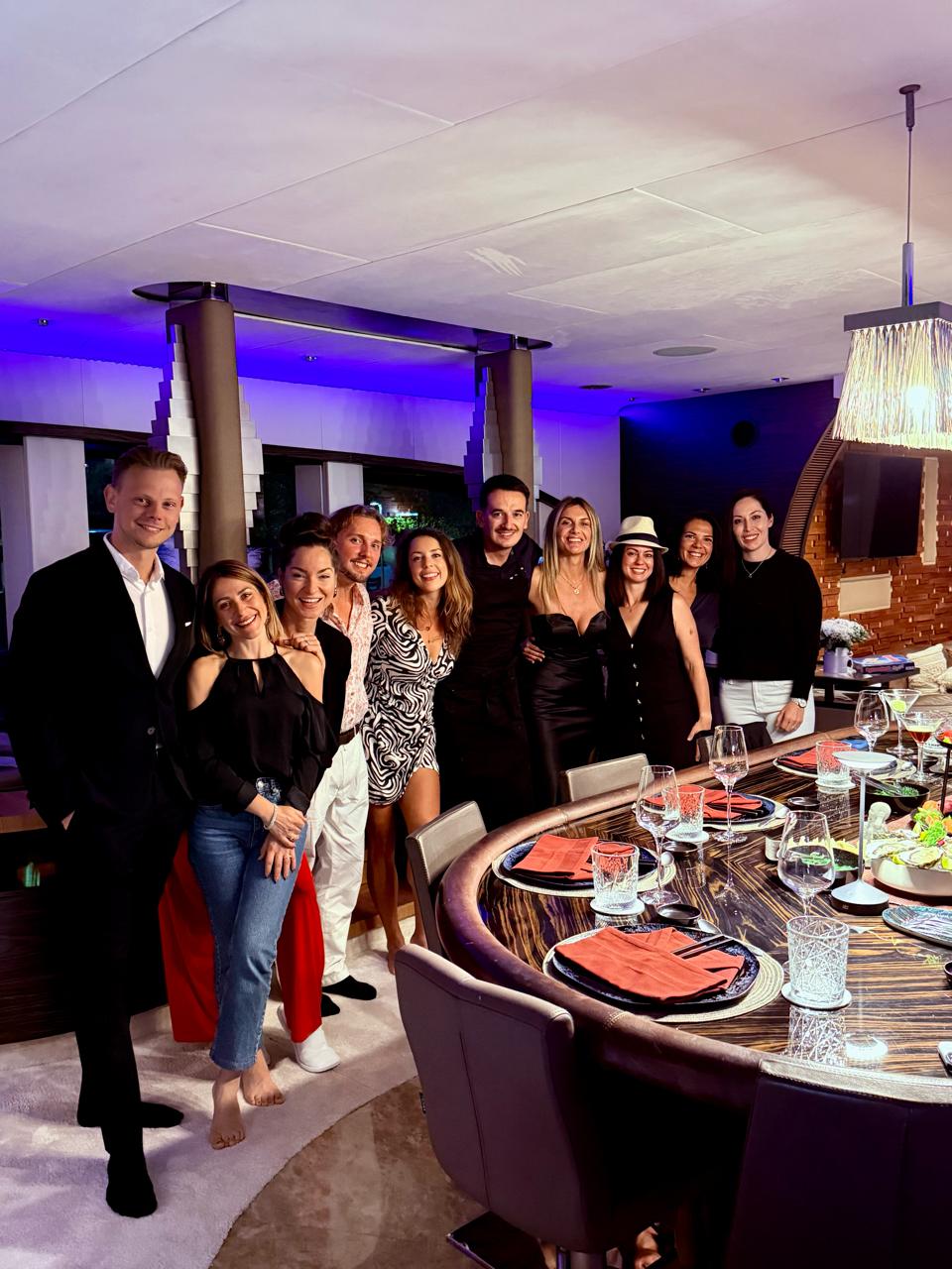 Brokers gathered for dinner in the main salon of ONE BLUE